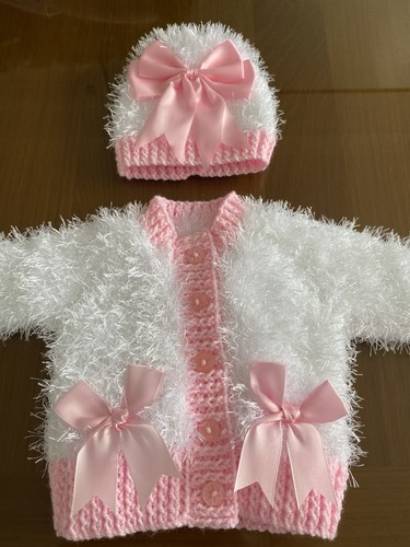 Hand knitted baby - hand,