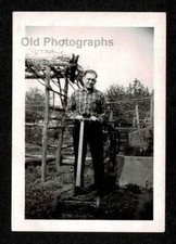 MAN OLD SCHOOL PUSH LAWN MOWER