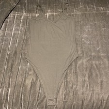 Ladies size XS UK size 6/8 khaki green PRIMARK ribbed effect strap bodysuit top