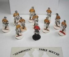 1950s “Newfooty Table Soccer” complete football team in orange strip