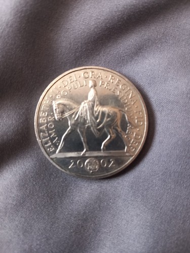 Unused five pound coin - pound,