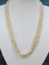 4-String Long Freshwater Cream Cultured Rice Pearl Necklace
