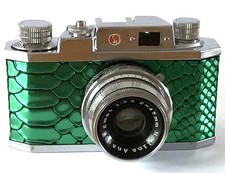 VINTAGE HALINA 35X CAMERA.  METALLIC GREEEN LIZARD SKIN COVERED