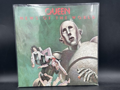 Queen news the world 12 - queen,