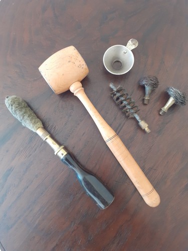 Antique black powder gun - black,