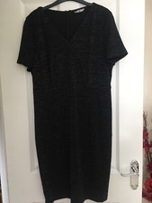 Stylish Tu Sainsburys black dress with silver fleck detail. Size 16