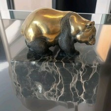 Bronze panda bear sculpture