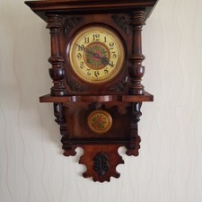 Antique Wall Clock with Key and Pendulum