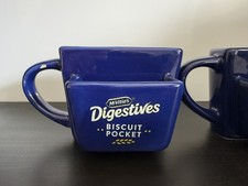 A pair of McVities Digestive Biscuit Pocket Mug blue