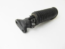 Footrest holder detent front