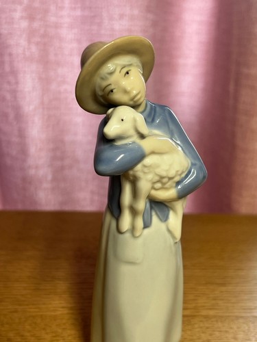 Rex valencia girl with lamb - valencia,