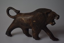Hand carved wooden lion. Unknown Brand.