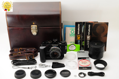 Olympus black film camera - olympus,