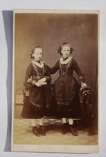 CDV OF TWO VICTORIAN GIRLS IN MATCHING DRESSES AND BOOTS