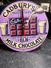 Cadbury’s metal wall Clock 20cm x 20cm  8in x 8in