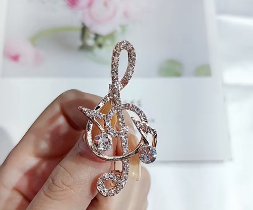 Brooch gold and - brooch,