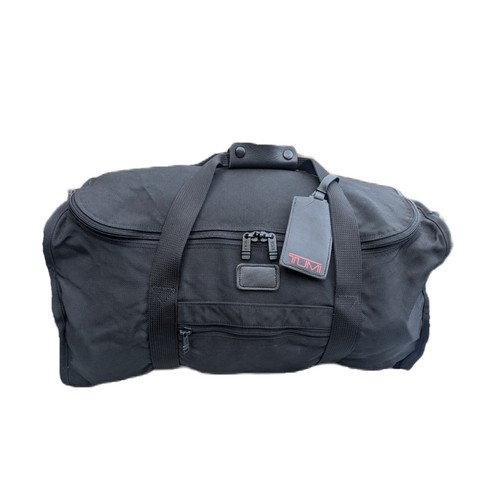 Tumi nylon and leather - and,
