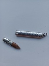 vintage silver fob or chatelaine pencil along with silver hall marked chain.