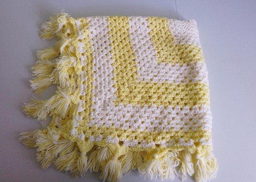 Yellow and white - and, knitted