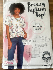 unused Breezy Peplum Top -