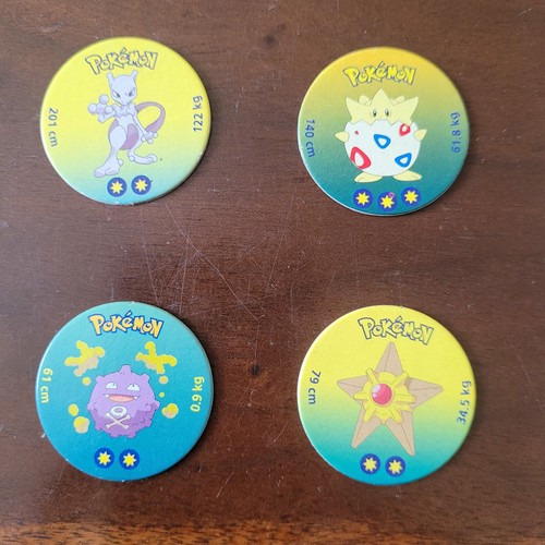 Pokemon pogs bundle of 4 - pogs.,