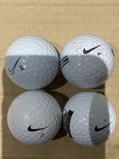 4 Used Nike Golfballs