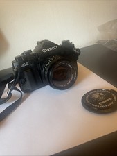 Canon A-1 SLR Camera with 35mm Film Black, Near Mint Olympic Cap, FD 50mm