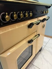 GAS RANGEMASTER CLASSIC 90CM RANGE COOKER IN CREAM AND BRASS. Ref--ED 256