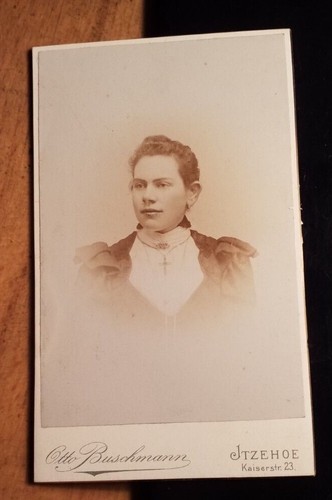 Young woman with cross