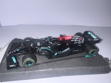 1/43rd SCALE MERCEDES AMG F1 MODEL OF LEWIS HAMILTON'S RACING CAR