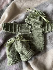 Hand Knitted dolls clothes to