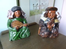 Vintage Hand Crafted Pair of Folk Art Ceramic Medieval musician figures. 