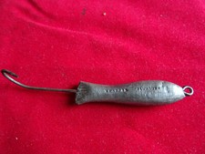 A RARE VINTAGE HEARDER OF PLYMOUTH LEAD SEA FISHING LURE PIRK