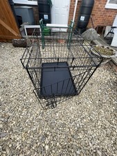 medium animal cage could fit a