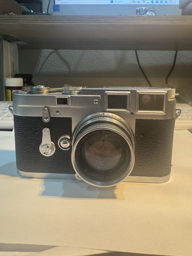 Leica camera with summicron - with,