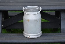 Vintage old aluminium milk