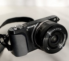 Sony NEX-3 Camera with 16MP Sensor, power zoom, tilt screen, pop up flash.