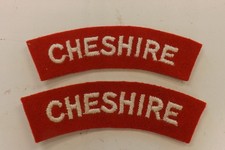TWO MILITARY CLOTH BADGES THE