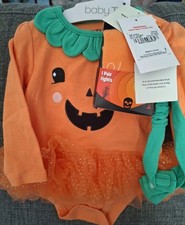 Babygrow, tights And Hairband