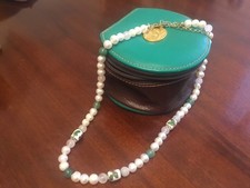String of real pearls, jade