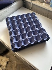 Grey cardboard egg trays - cardboard,