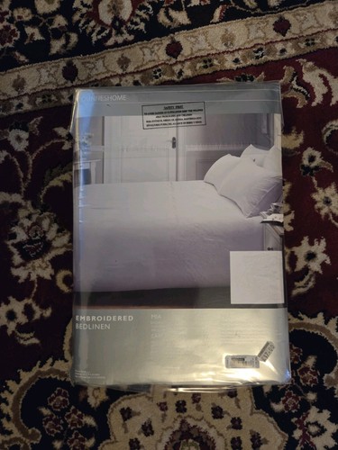 White embossed dunnes home - embossed,