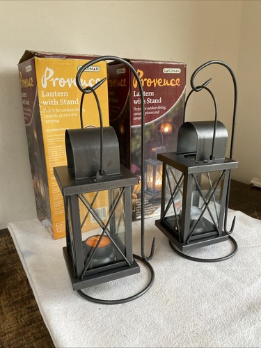 Two metal candle lanterns - candle,