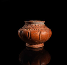 Ceramic jar with scoring and