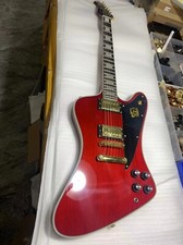 Red Firebird Style Guitar -