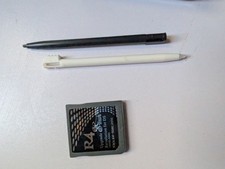 Nintendo DS Lite Handheld Gaming System Black with R4 Card and Games