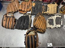 9 Pairs of Vintage Baseball Gloves