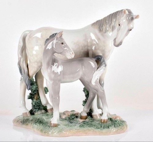 Lladro parent and child horse - and,