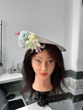 Pastel Garden Perch – Ivory Saucer Hat with Multicolor Floral Embellishments