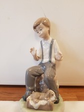 Lladro Nao Boy Figurine With